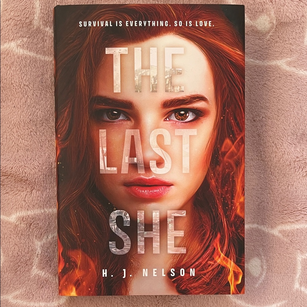 The Last She by H.J. Nelson Book
